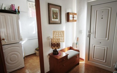 Spacious bungalow with a communal swimming pool and tennis court next to the golf club.